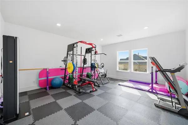 a view of play room with windows