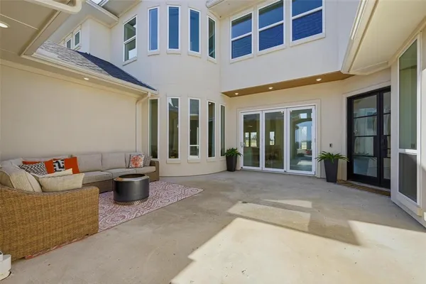 a view of a building with potted plants