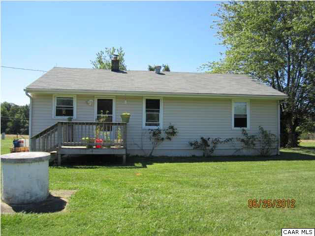 2785 Courthouse Road Louisa, VA 23093 - Photo 3 of 5 a front view of a house with a garden