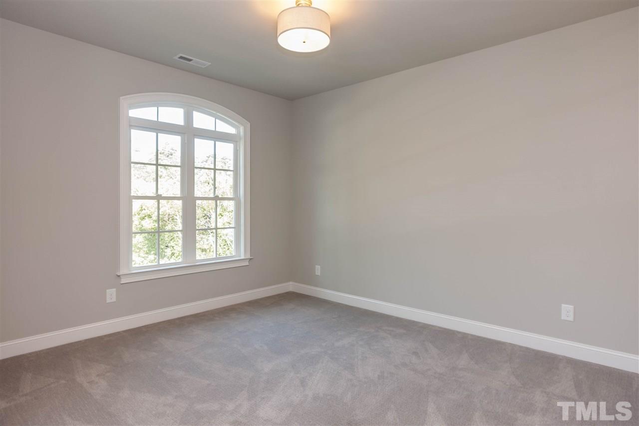 3106 Ashel Street Raleigh, NC 27612 - Photo 20 of 25 an empty room with a window
