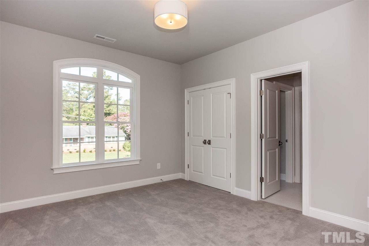 3106 Ashel Street Raleigh, NC 27612 - Photo 22 of 25 a view of an empty room with a window
