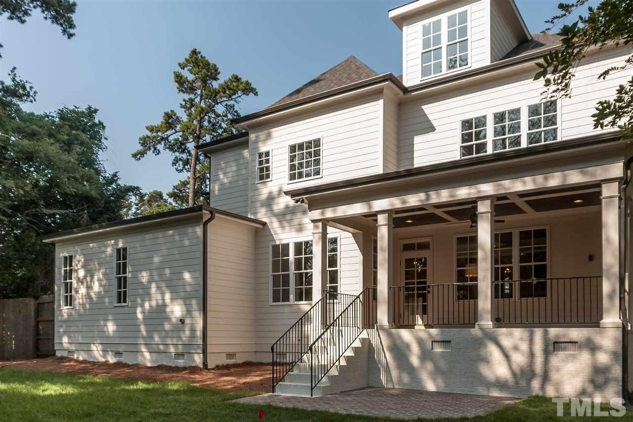 3106 Ashel Street Raleigh, NC 27612 - Photo 24 of 25 a front view of a house with a yard