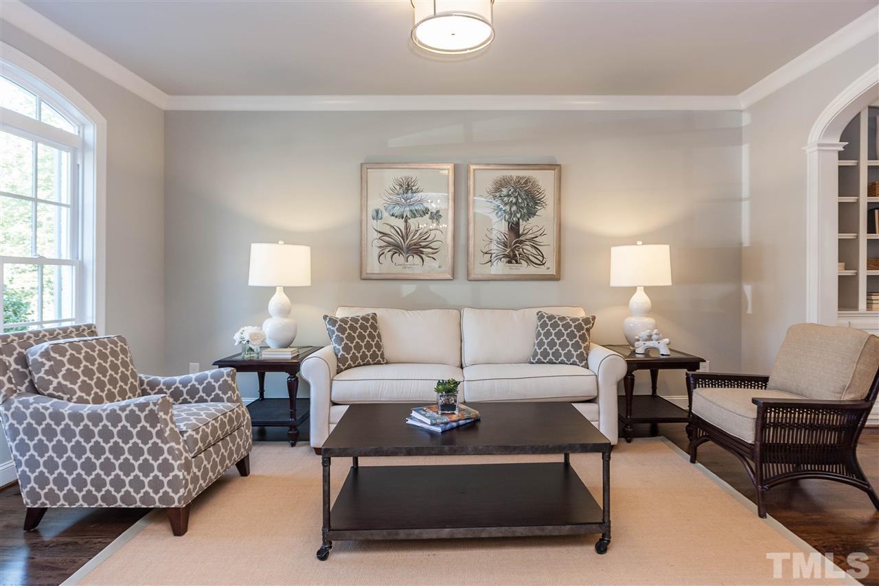 3106 Ashel Street Raleigh, NC 27612 - Photo 4 of 25 a living room with furniture and a large window