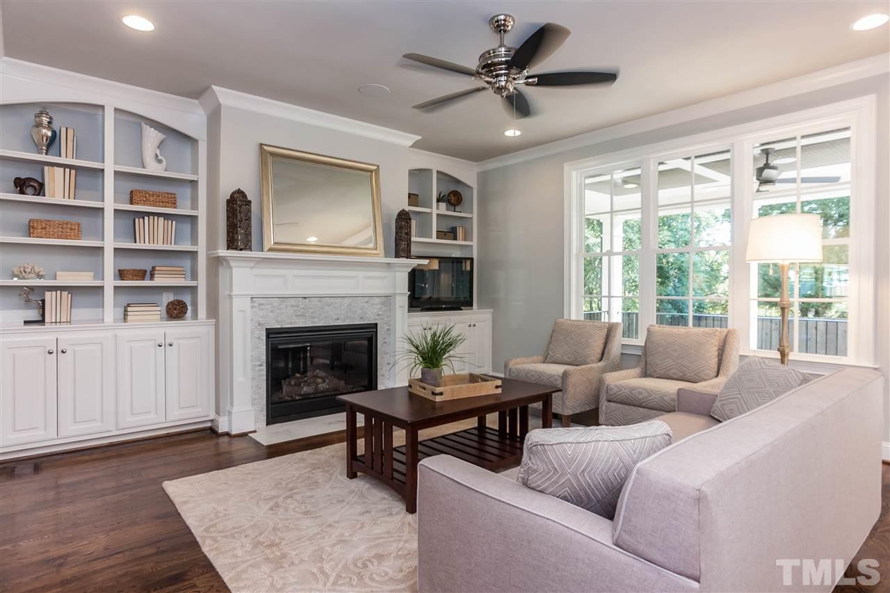 3106 Ashel Street Raleigh, NC 27612 - Photo 5 of 25 a living room with furniture fireplace and window