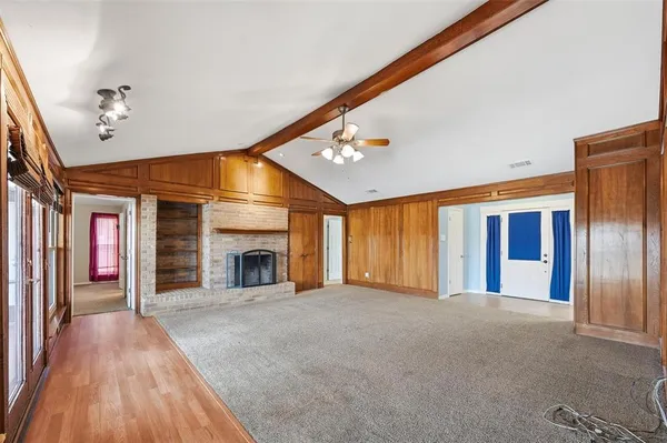 a view of a livingroom with a fireplace