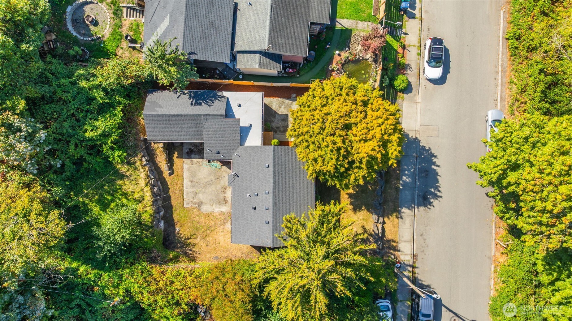 7051 South 125th Street Seattle, WA 98178 - Photo 28 of 32 an aerial view of a house with swimming pool