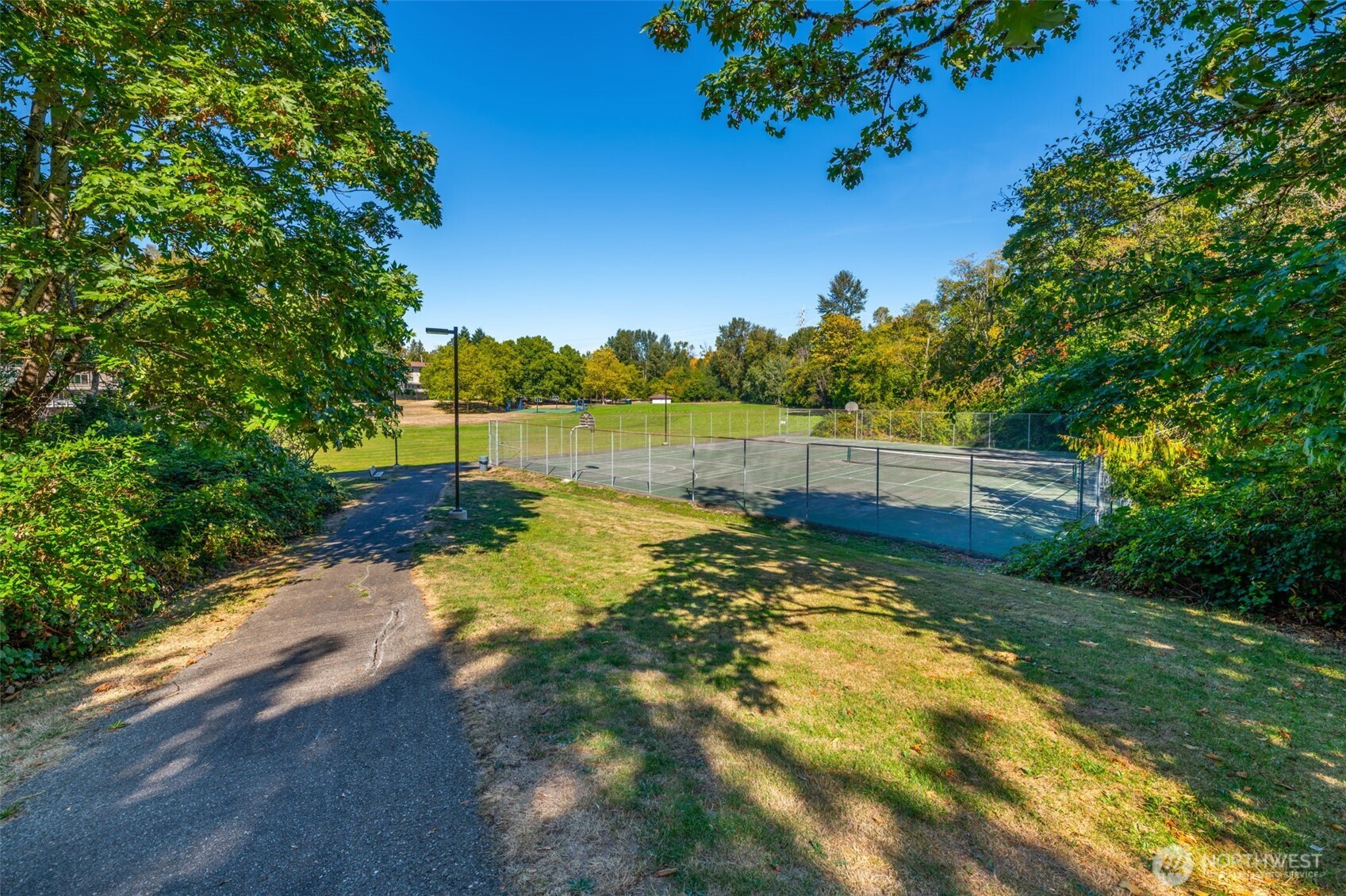 7051 South 125th Street Seattle, WA 98178 - Photo 30 of 32 a view of a lake with a big yard