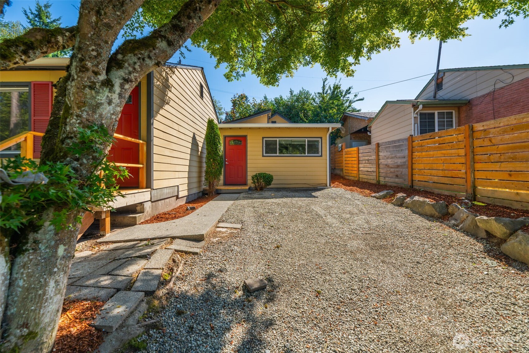 7051 South 125th Street Seattle, WA 98178 - Photo 3 of 32 a view of a house with a yard
