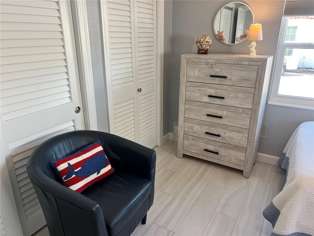 6154 Midnight Pass Road, Unit B02 Sarasota, FL 34242 - Photo 7 of 14 a view of a dresser
