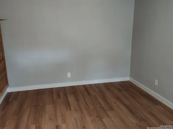 a view of backyard with green space