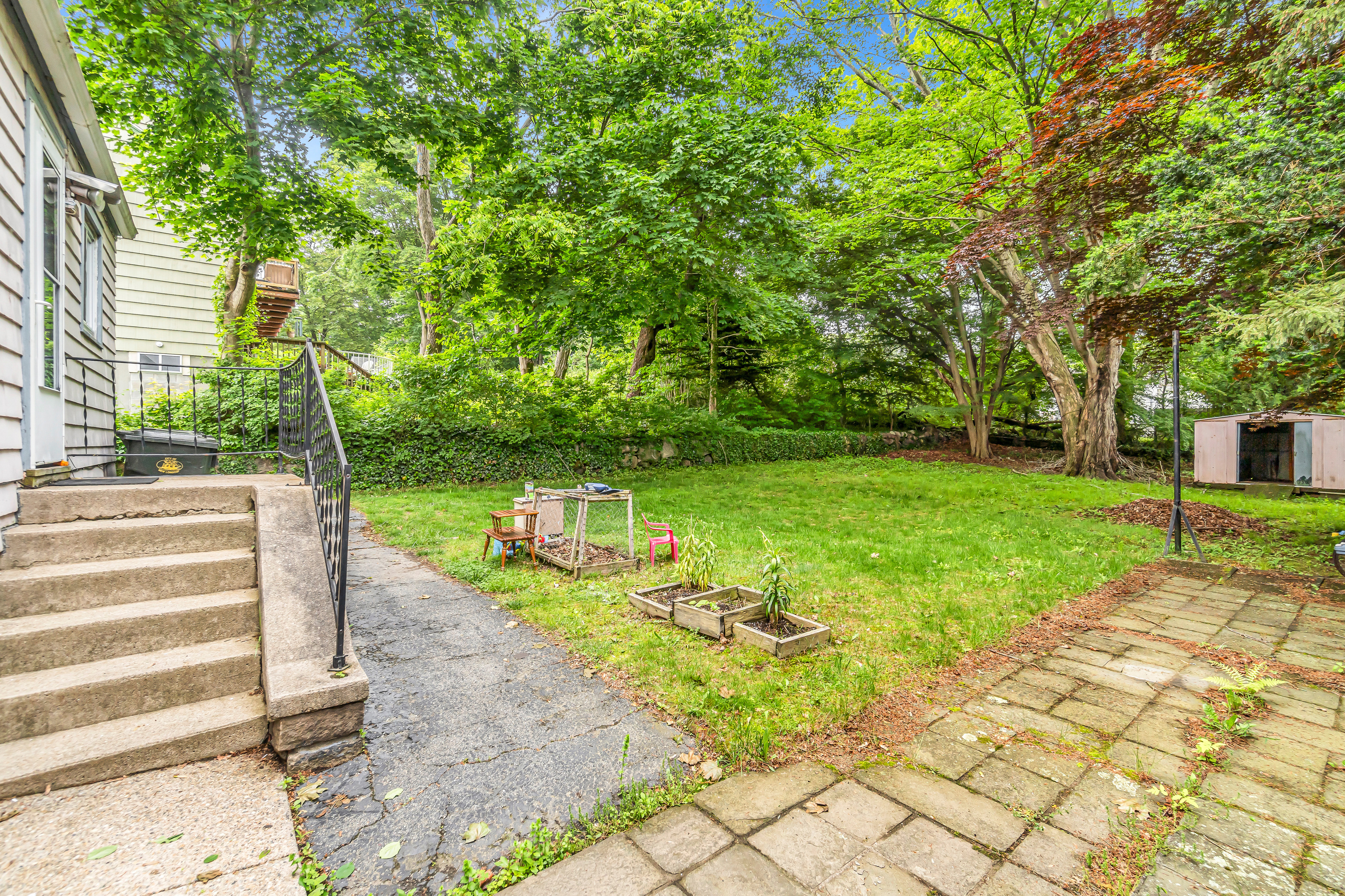 214 Thames Street New London, CT 06320 - Photo 28 of 32 a view of a patio with a yard