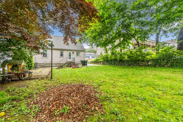 a house view with a garden space