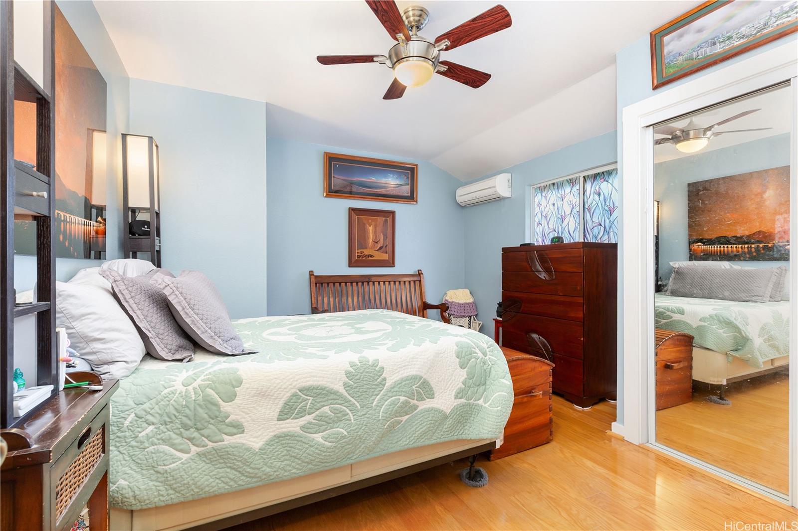 1508 Frear Street, Unit B Honolulu, HI 96813 - Photo 2 of 15 a bedroom with a bed and wooden floor