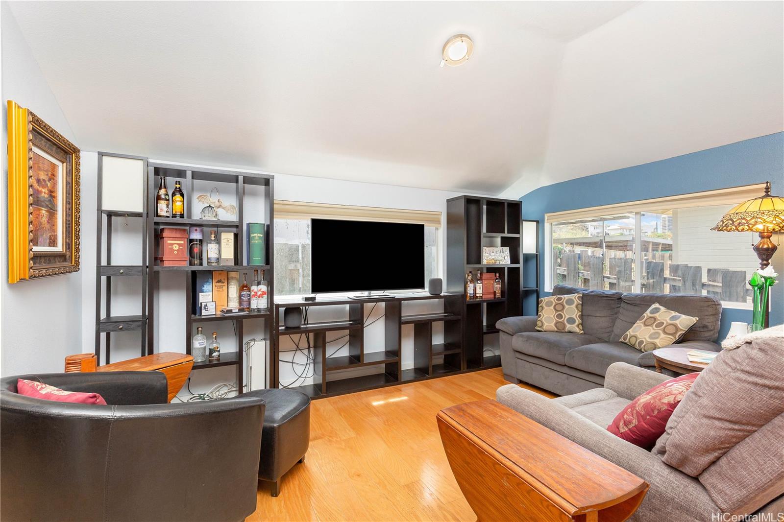 1508 Frear Street, Unit B Honolulu, HI 96813 - Photo 5 of 15 a living room with furniture and a flat screen tv