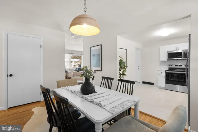 a view of a dining room with furniture
