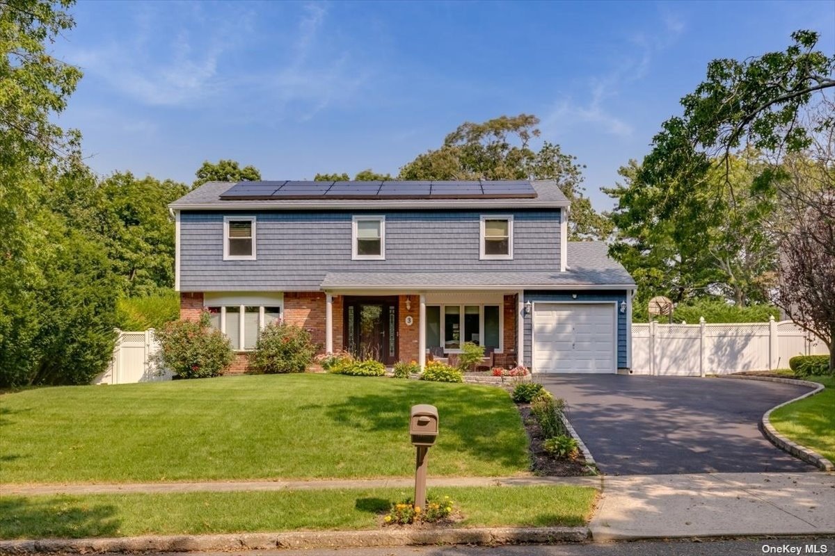 3 Eileen Court Commack, NY 11725 - Photo 1 of 1 a front view of a house with garden