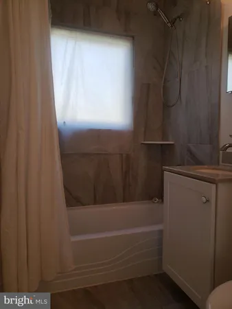 a bathroom with a bathtub