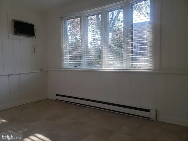 an empty room with a window