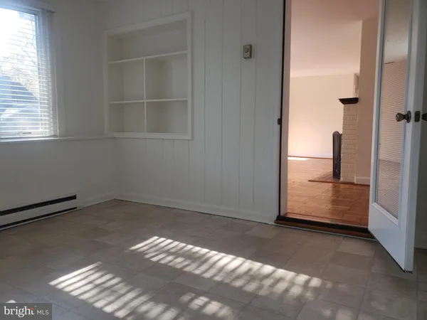 an empty room with windows