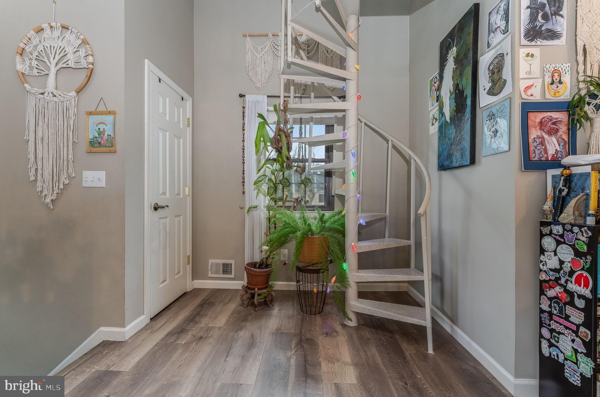 32 Azalea Circle Jackson, NJ 08527 - Photo 19 of 31 Charming spiral staircase in a cozy entryway.