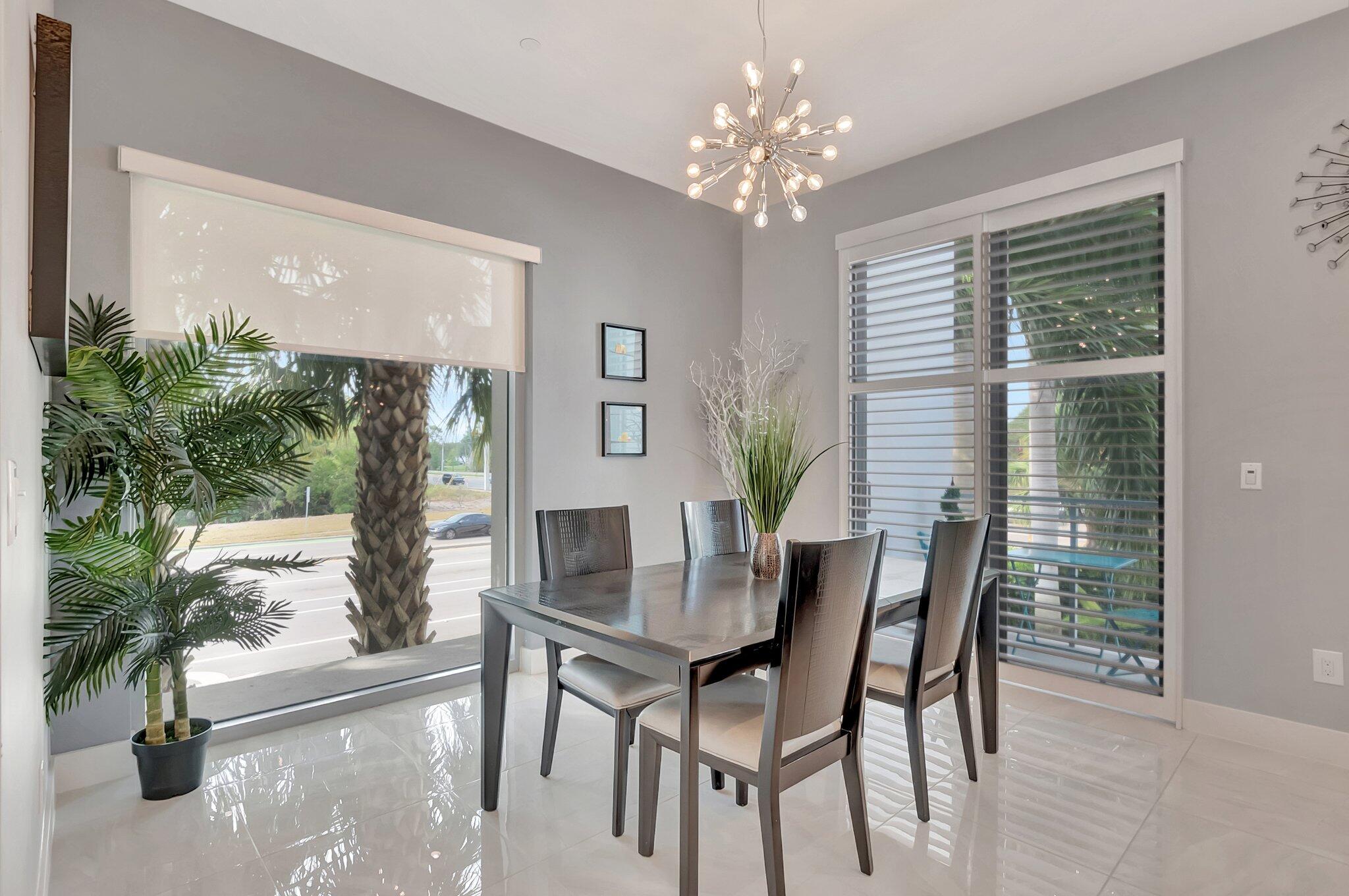 4010 Northwest 18th Way Boca Raton, FL 33431 - Photo 12 of 35 a view of a dining room with furniture and window