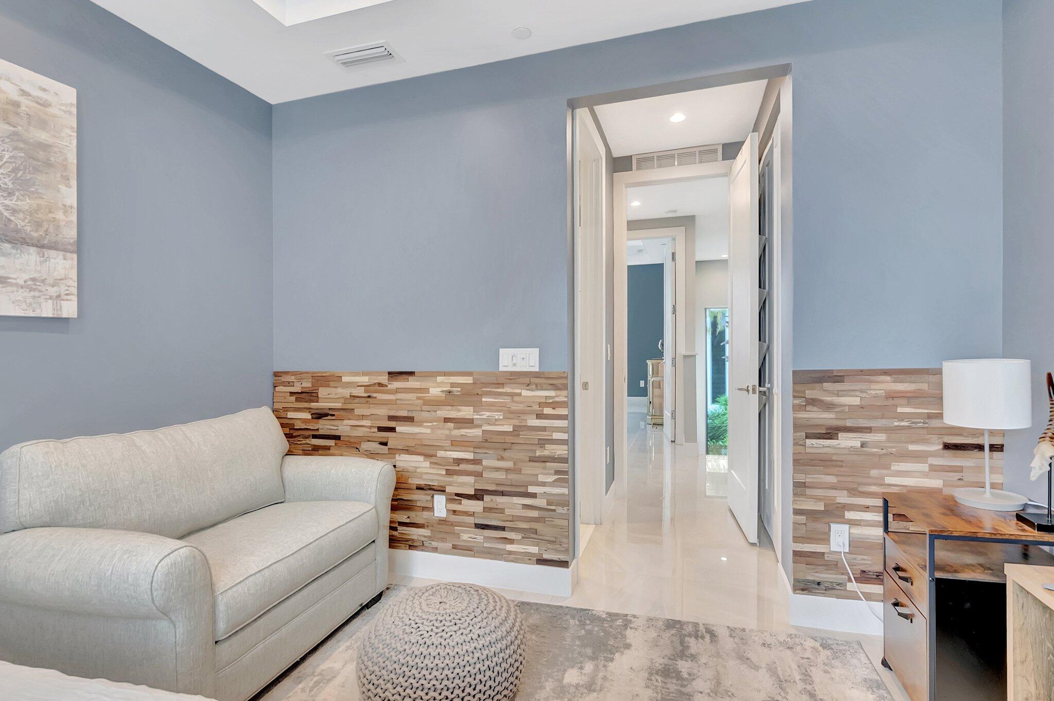 4010 Northwest 18th Way Boca Raton, FL 33431 - Photo 21 of 35 a living room with furniture and a fireplace