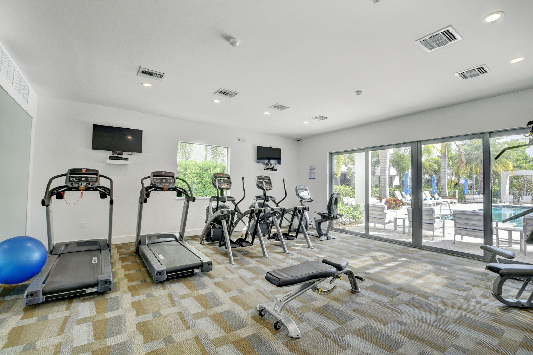 4010 Northwest 18th Way Boca Raton, FL 33431 - Photo 29 of 35 a view of a room with gym equipment
