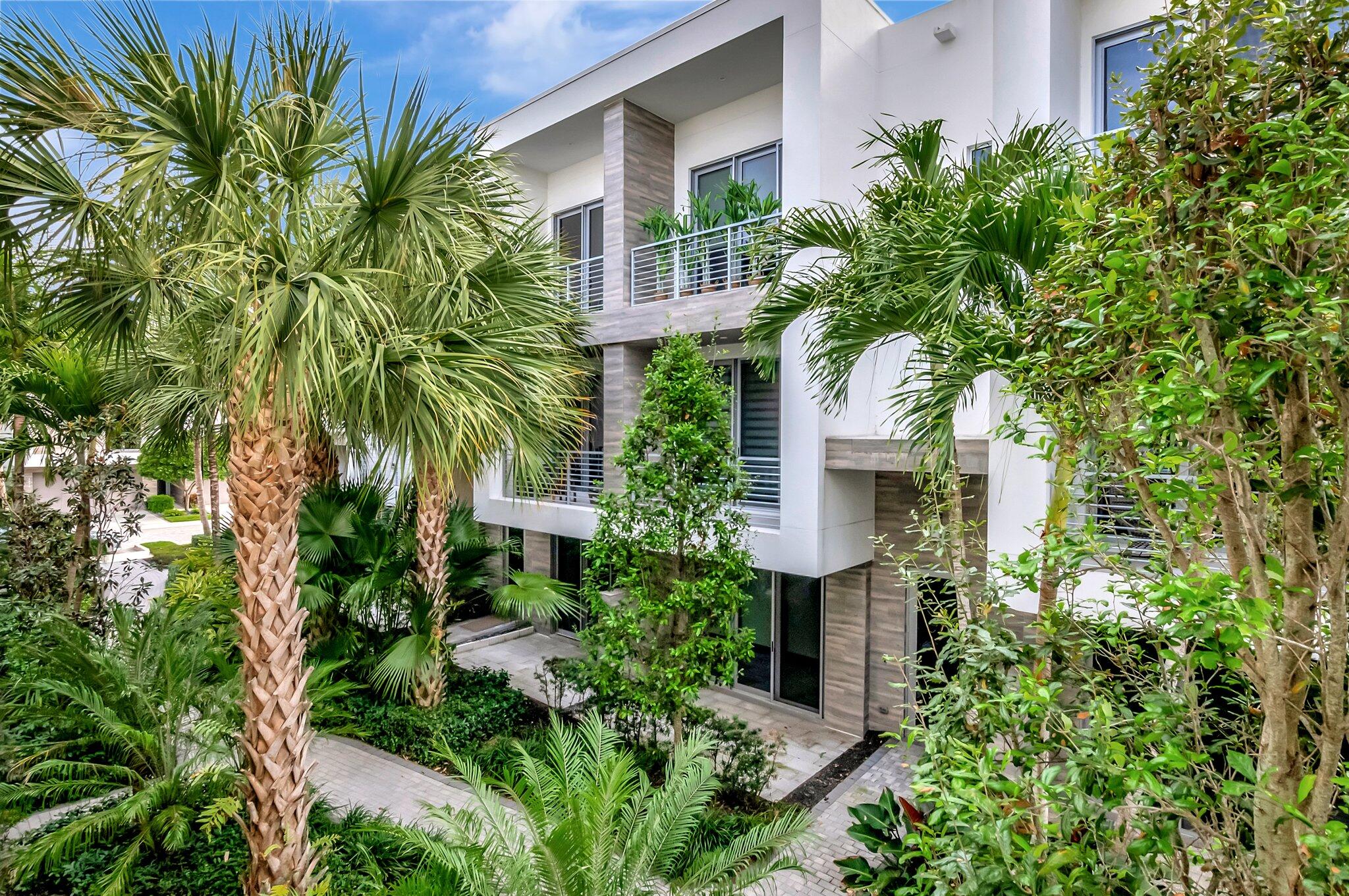 4010 Northwest 18th Way Boca Raton, FL 33431 - Photo 33 of 35 front view of a house with a tree