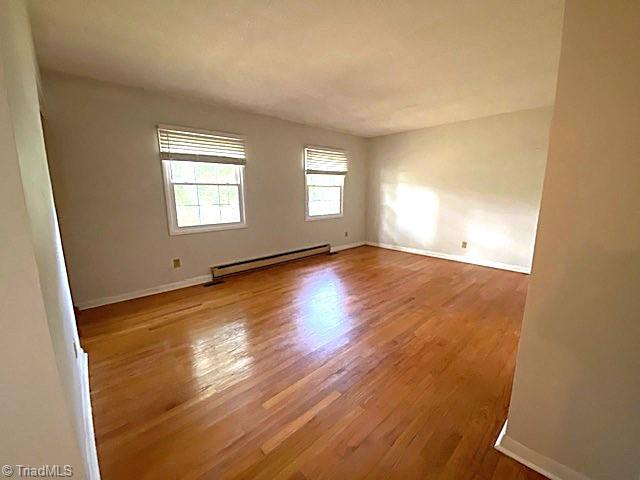 647 Hodgin Valley Road Pleasant Garden, NC 27313 - Photo 5 of 24 Livingroom with original hardwood floors.