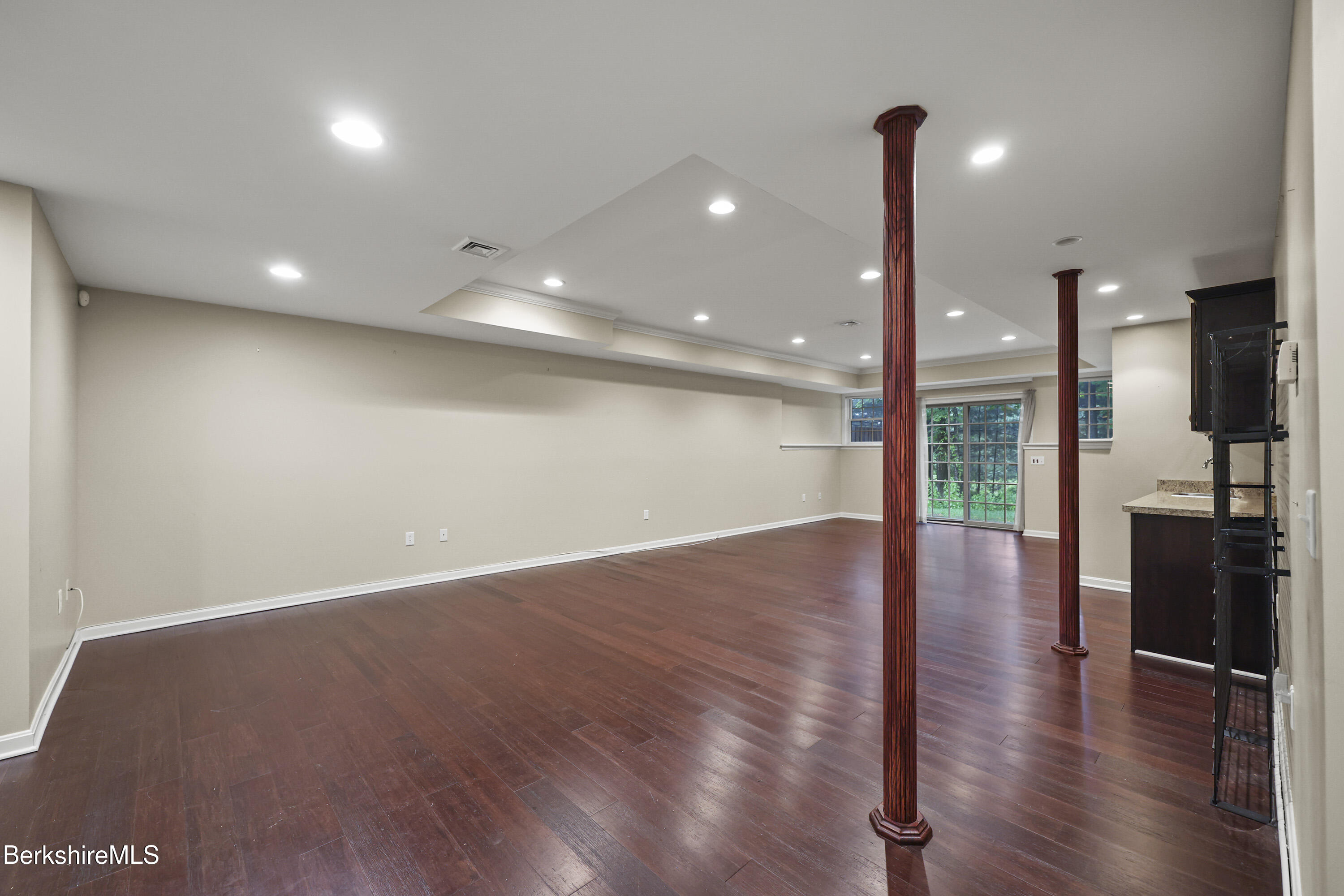 2 Amy Court Pittsfield, MA 01201 - Photo 41 of 50 a view of an empty room with wooden floor