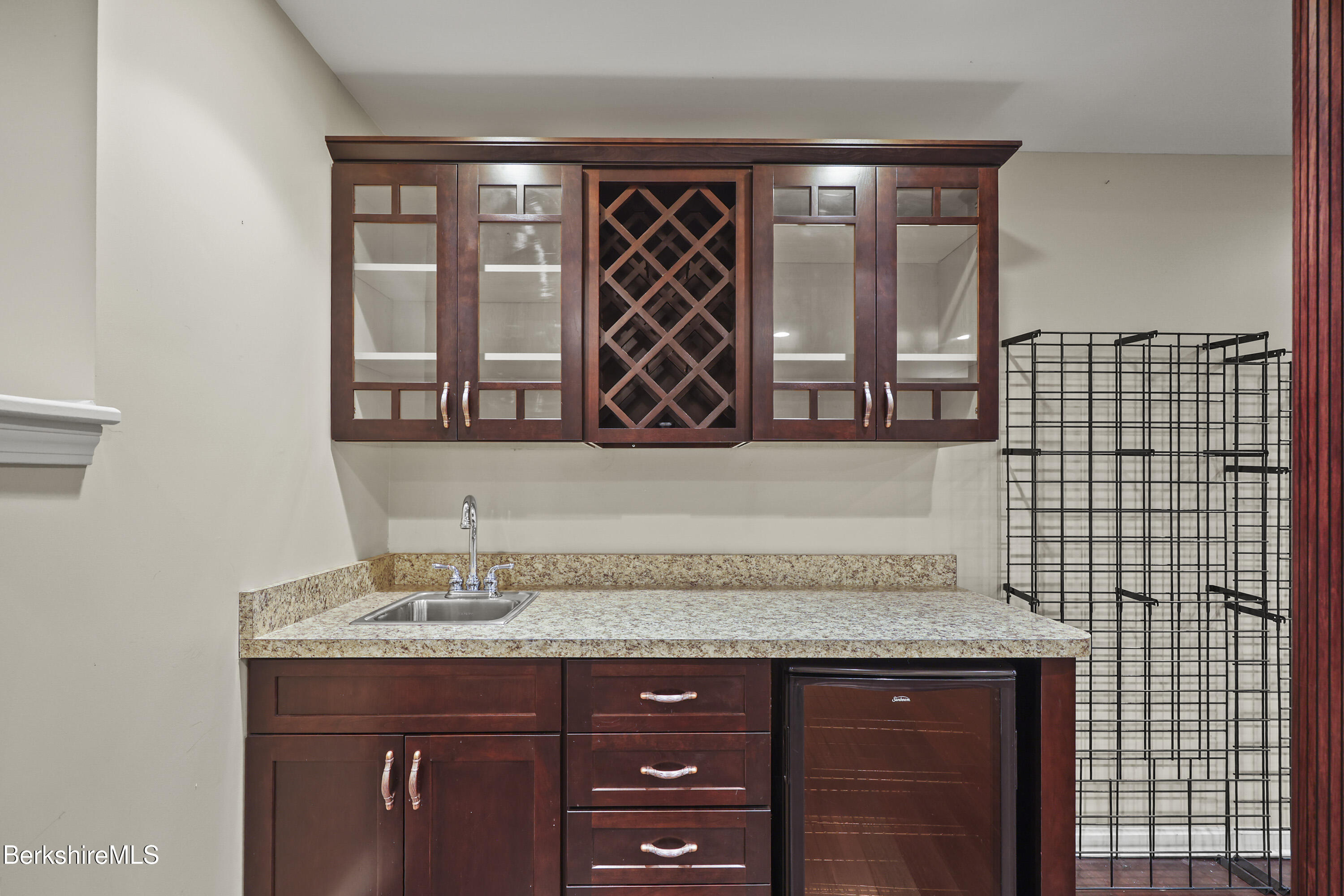 2 Amy Court Pittsfield, MA 01201 - Photo 43 of 50 a bathroom with a granite countertop sink a mirror and a shower