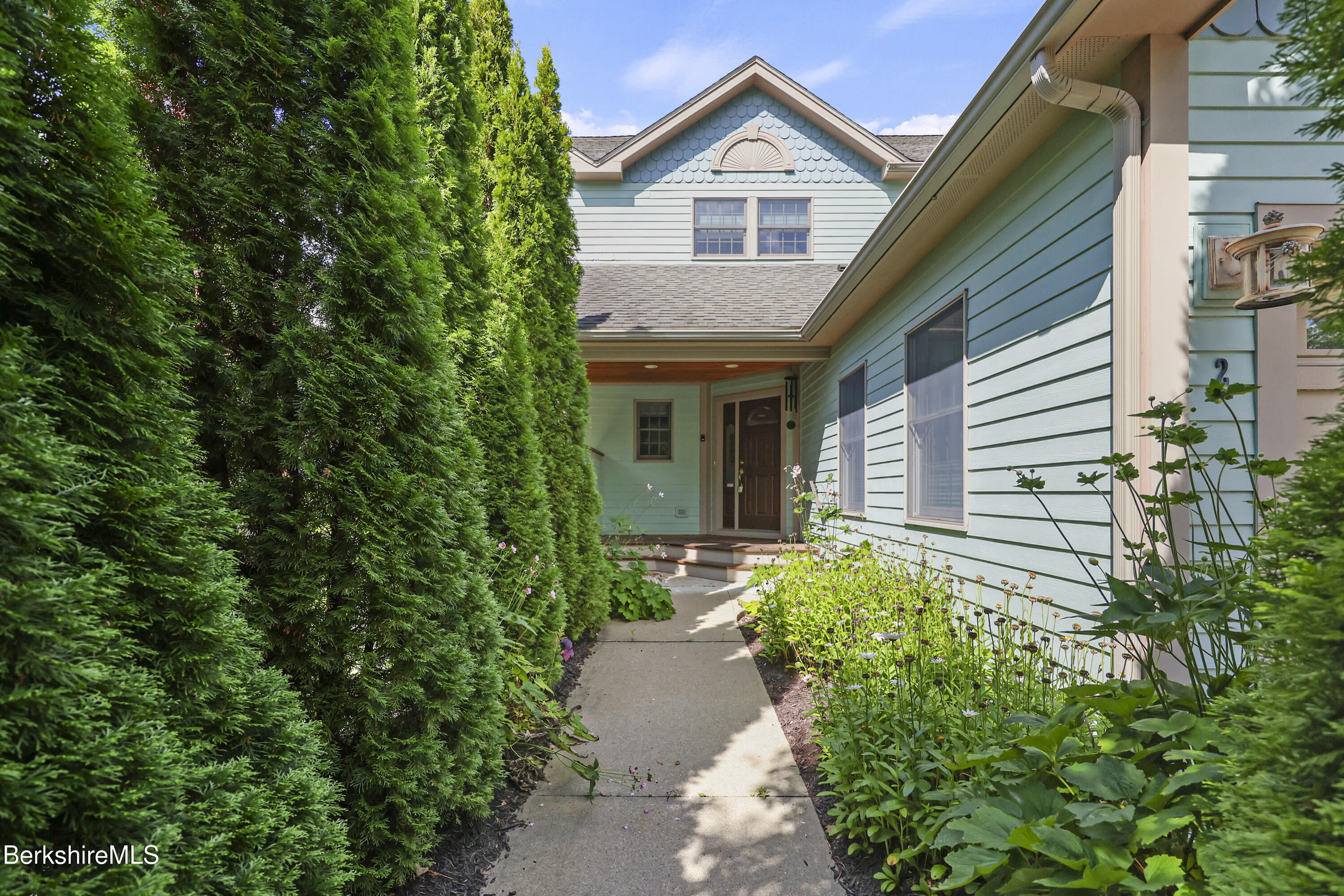 2 Amy Court Pittsfield, MA 01201 - Photo 6 of 50 a front view of a house with garden