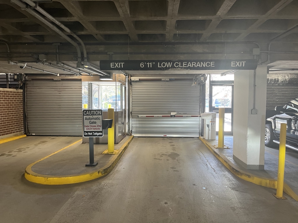 9 Hawthorne Place Boston, MA 02114 - Photo 3 of 5 a view of water heater room with wooden floor