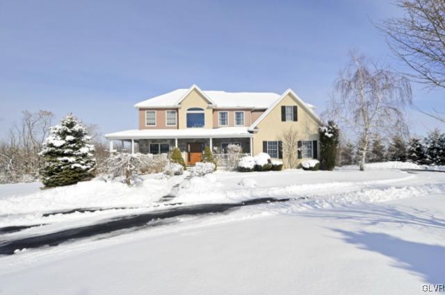 389 Winter Springs Road Nazareth, PA 18064 - Photo 1 of 37 a front view of a house with a yard