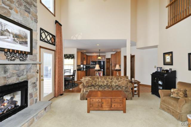 389 Winter Springs Road Nazareth, PA 18064 - Photo 11 of 37 a living room with furniture and a fireplace