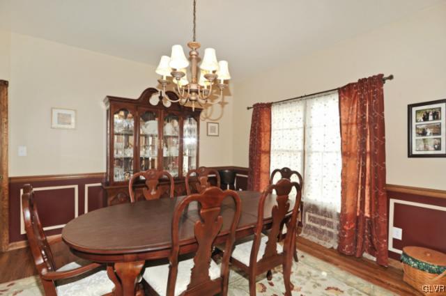 389 Winter Springs Road Nazareth, PA 18064 - Photo 14 of 37 a view of a dining room with furniture window and wooden floor