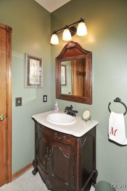 389 Winter Springs Road Nazareth, PA 18064 - Photo 17 of 37 a bathroom with a sink and a mirror