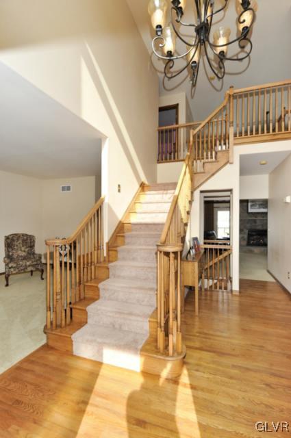 389 Winter Springs Road Nazareth, PA 18064 - Photo 19 of 37 a view of entryway and hall with wooden floor