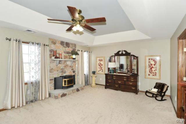 389 Winter Springs Road Nazareth, PA 18064 - Photo 21 of 37 a living room with furniture and a fireplace