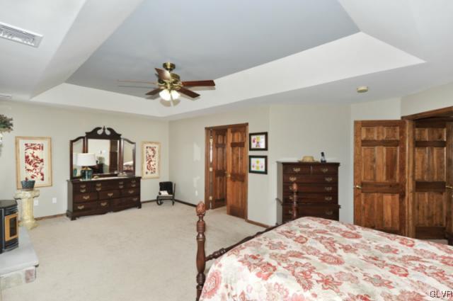 389 Winter Springs Road Nazareth, PA 18064 - Photo 23 of 37 a bedroom with a bed and a dresser