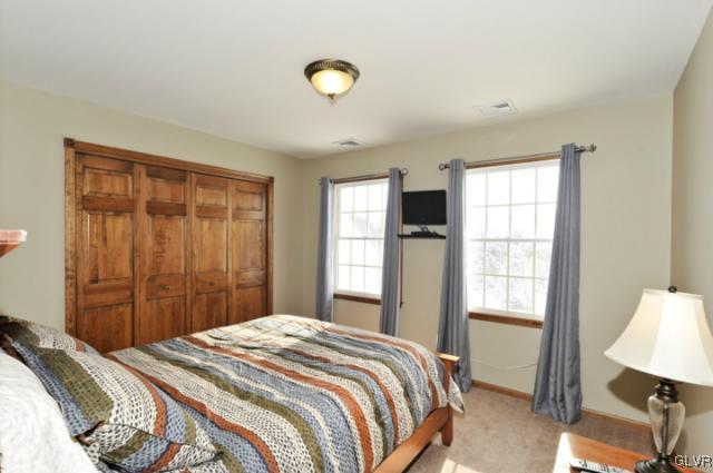 389 Winter Springs Road Nazareth, PA 18064 - Photo 30 of 37 a bedroom with a bed and a window