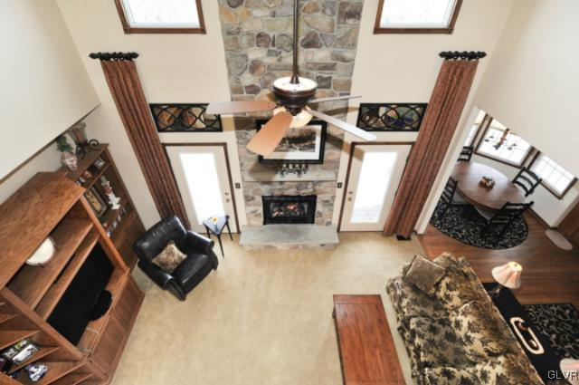 389 Winter Springs Road Nazareth, PA 18064 - Photo 34 of 37 a living room with furniture and a fireplace