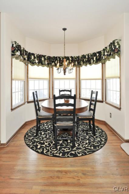 389 Winter Springs Road Nazareth, PA 18064 - Photo 9 of 37 a view of a dining room with furniture window and wooden floor