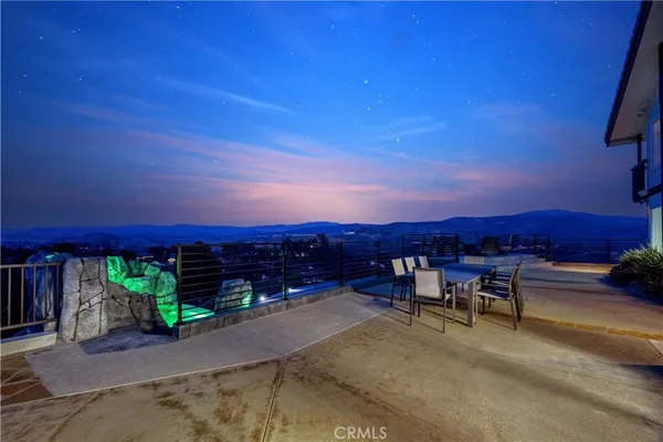a kitchen with stainless steel appliances granite countertop a stove and cabinets