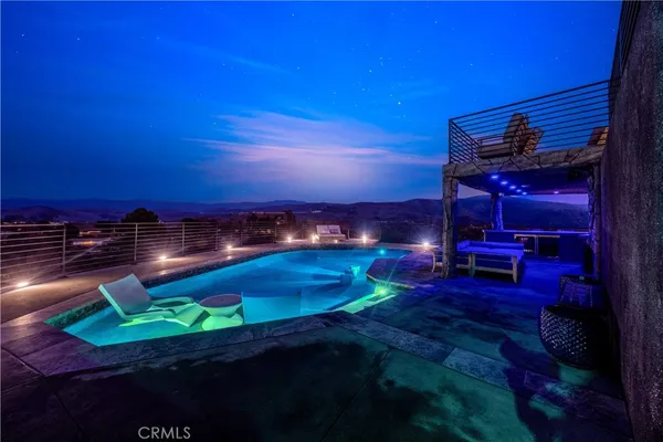 a view of a living room and a livingroom with furniture