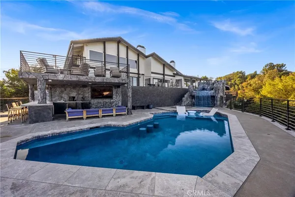 a view of a house with roof deck