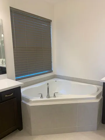 a bathroom with a sink and a bathtub