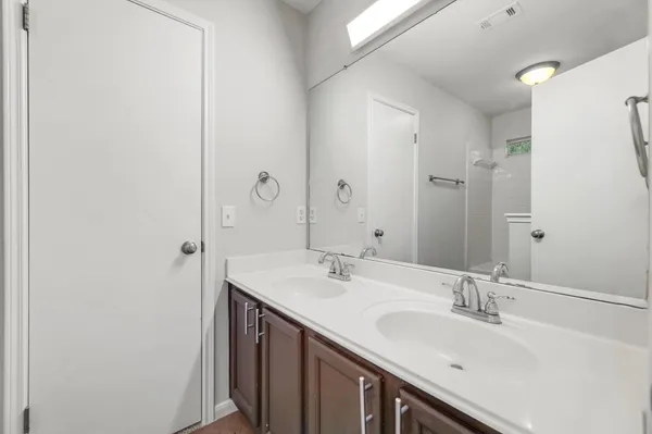 a bathroom with a bathtub and a toilet