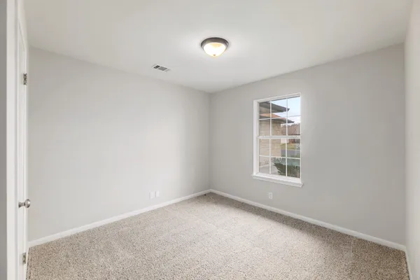 an empty room with a window