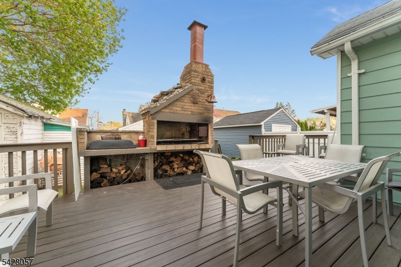 119 Edgewood Road Linden, NJ 07036 - Photo 11 of 31 a view of a house with patio and wooden floor